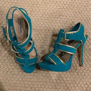 Blue heels with gold trim